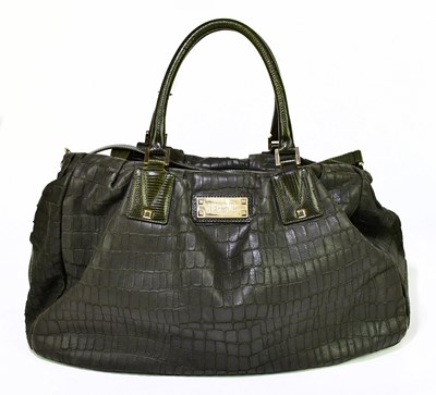 Lot 676 - VERSUS; a green embossed crocodile skin large...