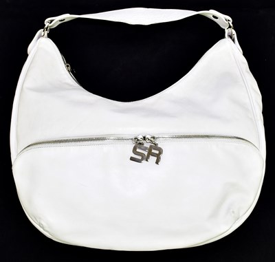 Lot 684 - SONIA RYKIEL; a white leather round shaped...