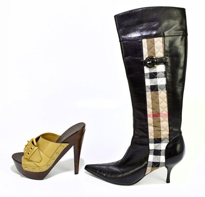 Lot 791 - A pair of black leather stiletto boots with...