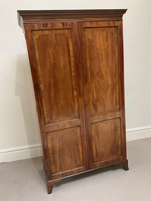 Lot 1195 - A 19th century mahogany two door...