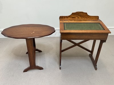 Lot 1304 - A small writing table with leather inset top...