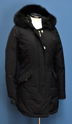 Lot 746 - WOOLRICH; a black short length padded jacket,...