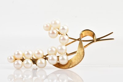 Lot 118 - A Japanese pearl set leaf brooch, set with...