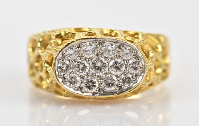 Lot 390 - An 18ct yellow gold diamond set nugget effect...