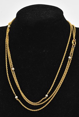 Lot 215 - A heavy gauge yellow rope twist effect belcher...