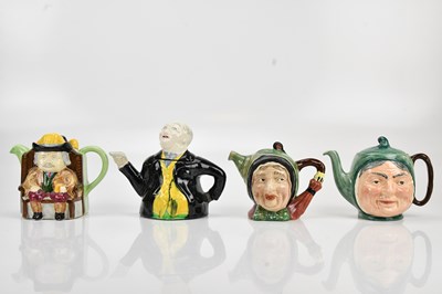 Lot 1392 - Four decorative character teapots including a...