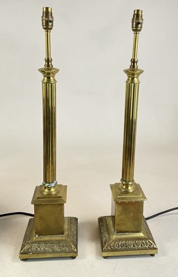 Lot 762 - A pair of brass table lamps with fluted...