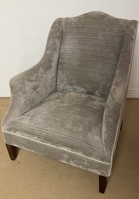 Lot 828 - A high back armchair with velvet upholstery...