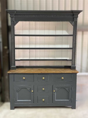 Lot 644 - A painted oak Welsh dresser with cupboards and...