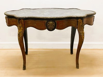 Lot 655 - A mid 19th century French centre table with...