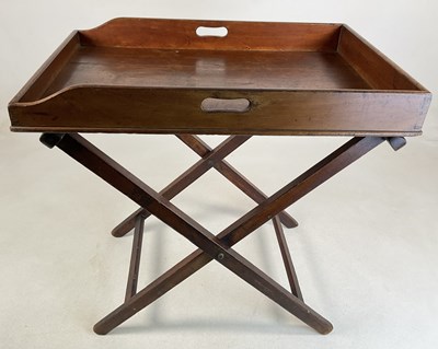 Lot 814 - A 19th century mahogany butler's tray on a...