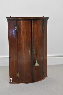 Lot 1287 - A 19th century oak two door wall hanging...