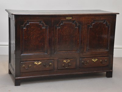 Lot 1257 - An 18th century oak coffer, later converted...
