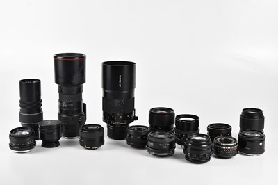 Lot 111 - A collection of fifteen lenses, to include a...