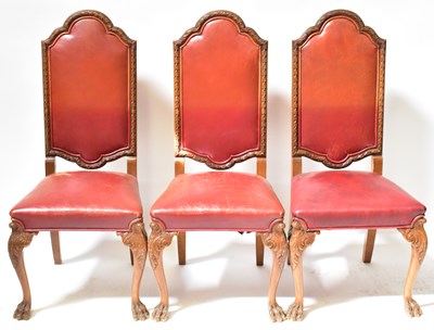 Lot 13 - A reproduction walnut dining suite, comprising...