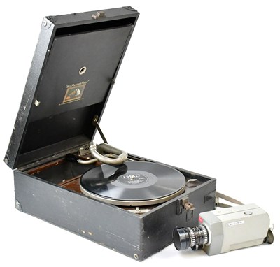 Lot 737 - An HMV portable gramophone with a 78rpm record,...