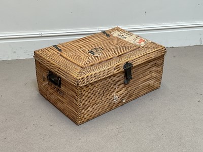 Lot 2023 - An early 20th century wicker travelling trunk,...