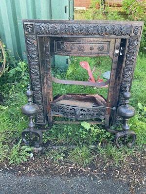 Lot 2143 - A late 19th century cast iron fire surround,...