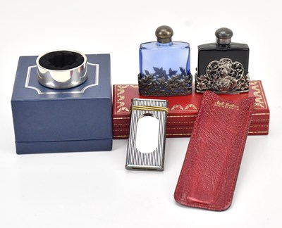 Lot 133 - MUST DE CARTIER; a white metal fluted cigar...