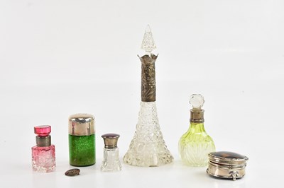 Lot 210 - Five glass perfume bottles with hallmarked...