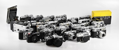 Lot 124 - A collection of film cameras, to include a...