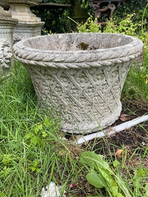 Lot 2164 - A reconstituted stone garden planter with...