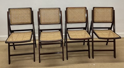 Lot 870 - Four mahogany framed folding chairs with cane...