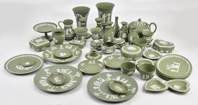 Lot 1366 - WEDGWOOD; a collection of green jasperware,...