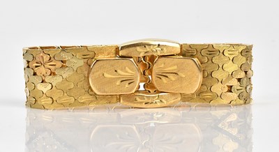 Lot 113 - An 18ct yellow, white and rose textured gold...
