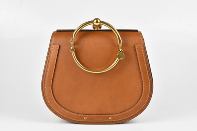 Lot 1328 - CHLOE; a tan calfskin leather and suede Nile...