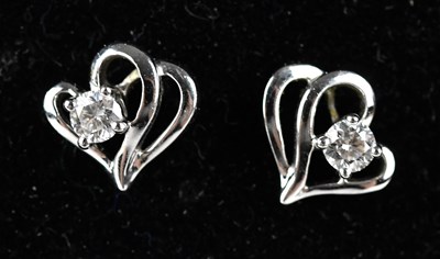 Lot 177 - A pair of 18ct white gold diamond set ear...