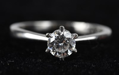 Lot 400 - A white metal diamond set solitaire ring, the...