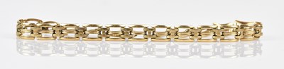 Lot 55 - A 9ct yellow gold openwork gate link bracelet,...