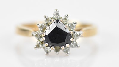 Lot 481 - A 9ct yellow gold heart shaped cluster ring...