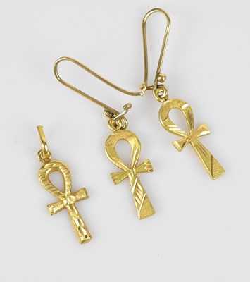 Lot 178 - A pair of Egyptian yellow metal earrings and...