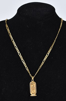 Lot 237 - An Egyptian oval pendant set with...
