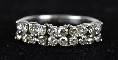 Lot 401 - An 18ct white gold diamond set eighteen stone...