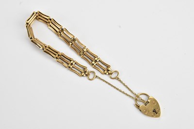 Lot 91 - A 9ct yellow gold gate link bracelet with...