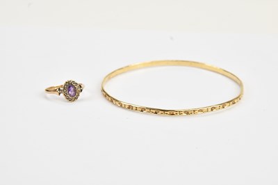Lot 62 - A 9ct yellow gold and seed pearl set cluster...