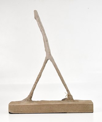 Lot 608 - An Alberto Giacometti style concrete sculpture...