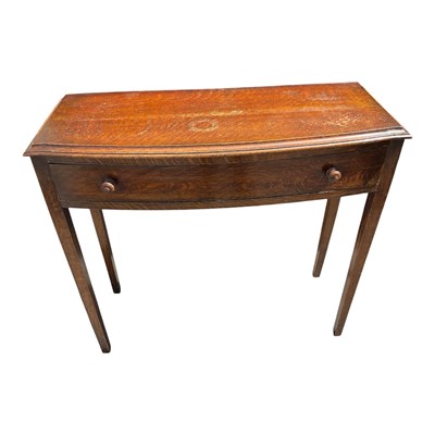 Lot 1325 - An oak single drawer side table, height 77cm,...