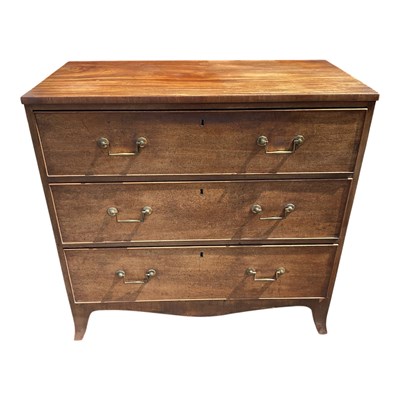 Lot 1211 - An early 19th century mahogany chest of three...