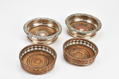 Lot 1474 - Two pairs of electroplated bottle coasters,...