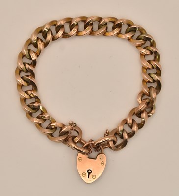 Lot 1414 - A 9ct rose gold bracelet, with a 9ct rose gold...