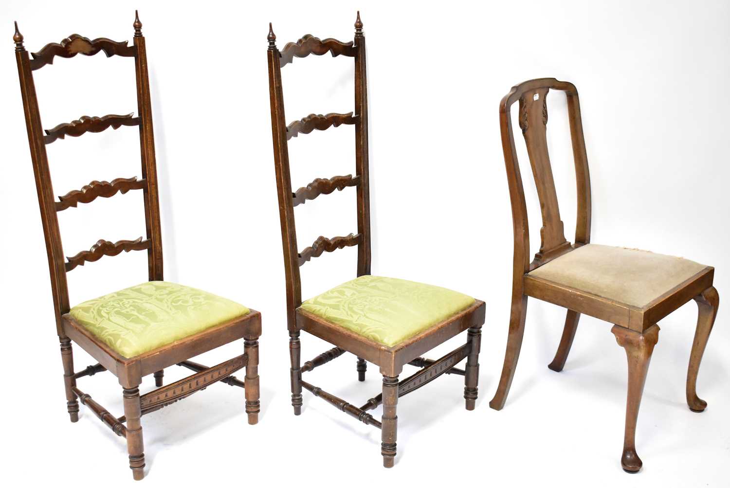 Lot 31 - A pair of mahogany high-backed ladder chairs,...