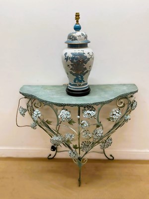Lot 830 - A modern metal design hall table, decorated...