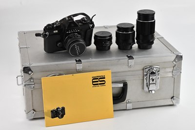 Lot 106 - PENTAX; an ES 35mm film camera, with four...