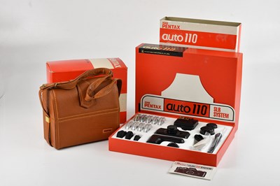 Lot 118 - PENTAX; an Auto 110 film camera system,...