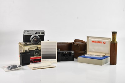 Lot 122 - A collection of cameras and photography...