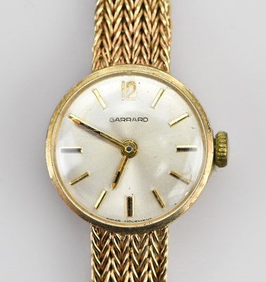 Lot 1184 - GARRARD; a 9ct yellow gold cased lady's...